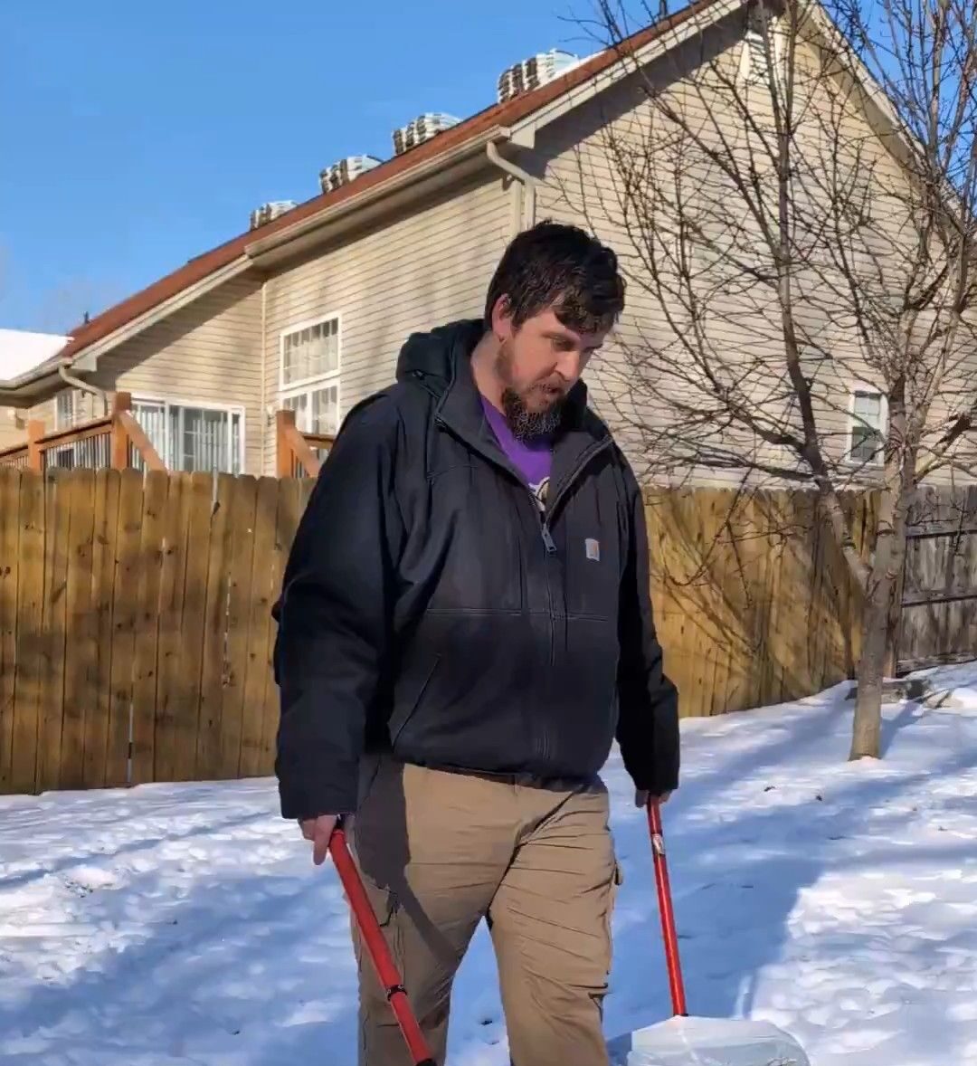 Doggy Doods owner Eugene scooping dog poop in cold weather and snow